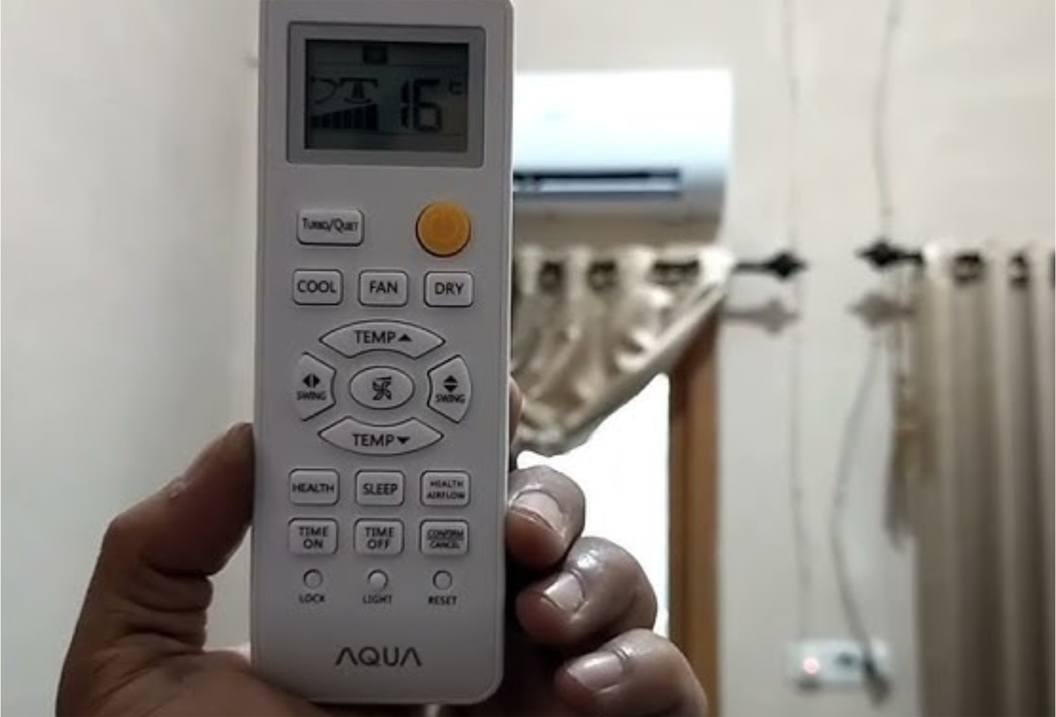 fungsi remot ac aqua